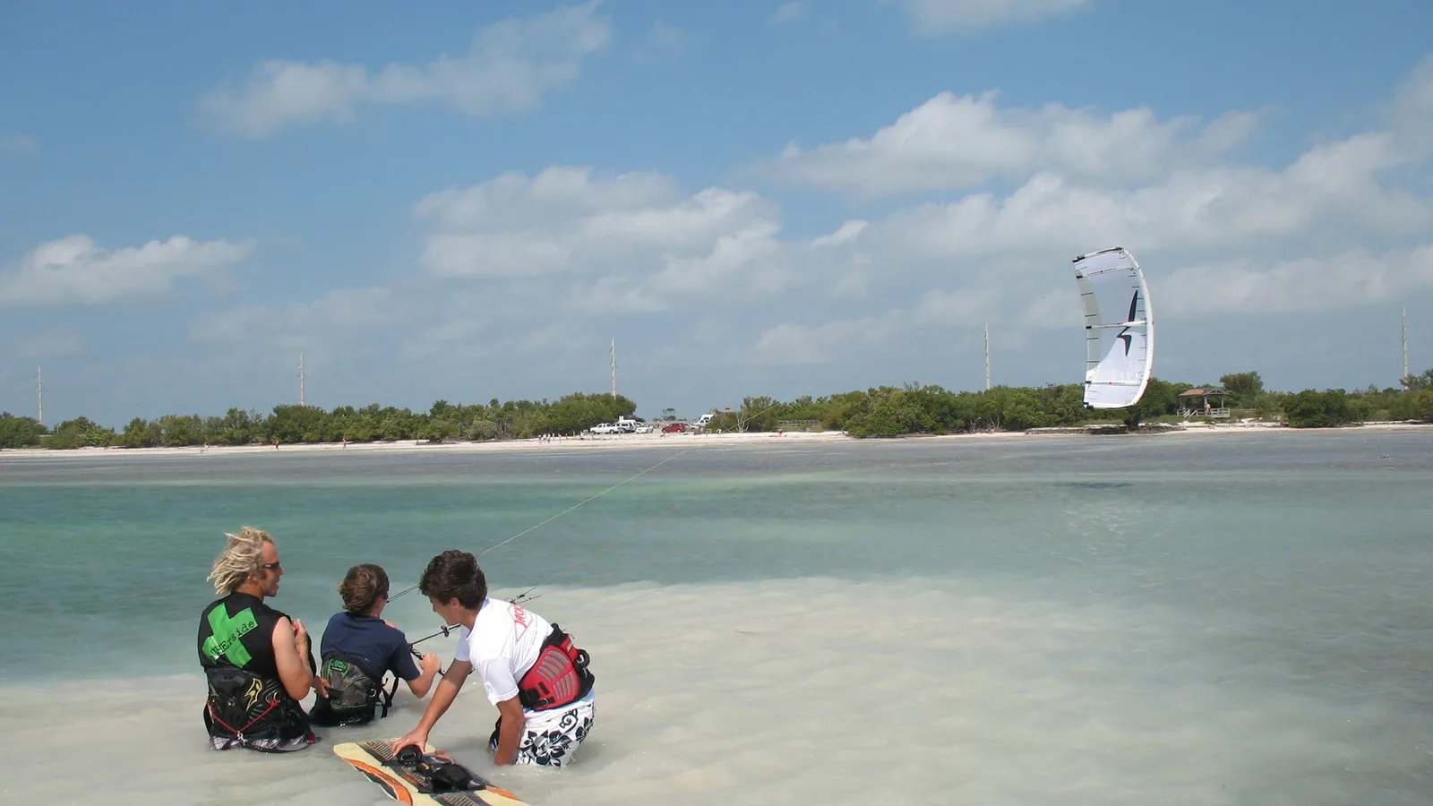 Kiteboarders in shallow turquoise water at Anne's Beach, Islamorada, Florida Keys