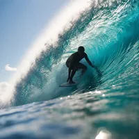 A surfer riding a wave