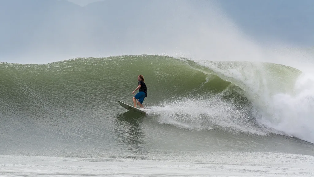 A surfer riding inside a heavy, hollow wave at Punta Zicatela, Puerto Escondido, Oaxaca, Mexico